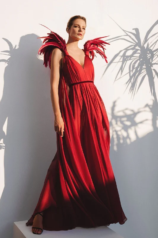 Deep saturated silk chiffon dress with a plunging neckline and feathered shoulders