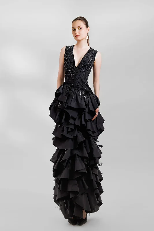 Sleeveless beaded gown with taffeta layers