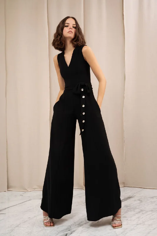 Sleeveless jumpsuit with wide legs and buttons