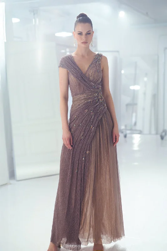 One sleeve pleated gown with beading