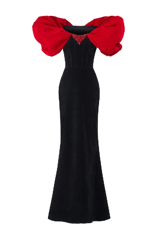 STRAPLESS BLACK VELVET GOWN WITH DRAPED SHOULDER DETAILS